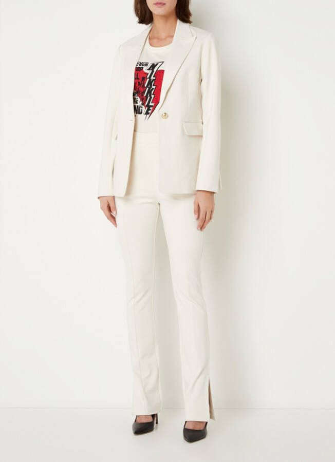 NIKKIE Punta Paris high waist flared fit pantalon met stretch